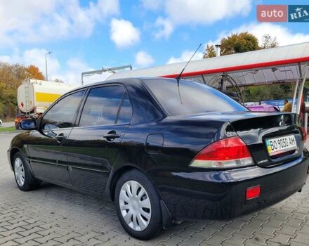 Міцубісі Lancer 2008 у Тернополі на Automoto.ua Чорний Міцубісі Lancer, об'ємом двигуна 1.58 л та пробігом 182 тис. км за 5600 $, фото 2 на Automoto.ua