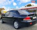 Міцубісі Lancer 2008 у Тернополі на Automoto.ua Чорний Міцубісі Lancer, об'ємом двигуна 1.58 л та пробігом 182 тис. км за 5600 $, фото 2 на Automoto.ua