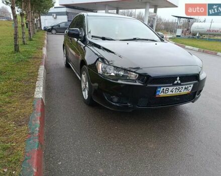 Черный Мицубиси Лансер, объемом двигателя 2 л и пробегом 200 тыс. км за 5100 $, фото 17 на Automoto.ua