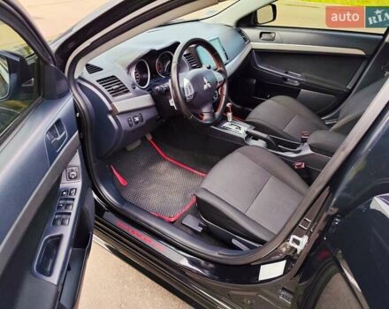 Чорний Міцубісі Lancer, об'ємом двигуна 2 л та пробігом 175 тис. км за 7800 $, фото 10 на Automoto.ua