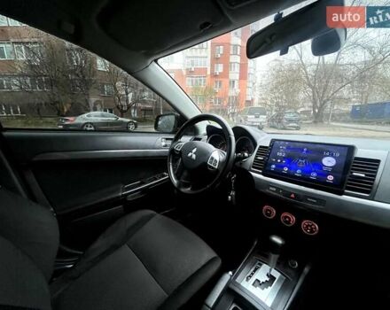 Черный Мицубиси Лансер, объемом двигателя 2 л и пробегом 217 тыс. км за 7000 $, фото 6 на Automoto.ua