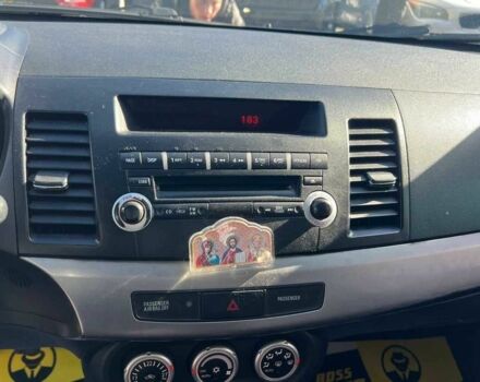 Черный Мицубиси Лансер, объемом двигателя 2 л и пробегом 215 тыс. км за 7000 $, фото 11 на Automoto.ua