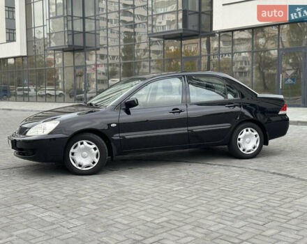 Чорний Міцубісі Lancer, об'ємом двигуна 1.58 л та пробігом 128 тис. км за 5999 $, фото 3 на Automoto.ua