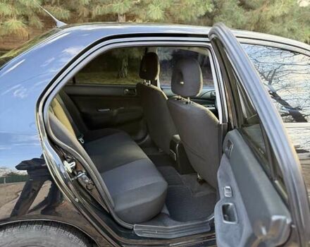 Чорний Міцубісі Lancer, об'ємом двигуна 1.6 л та пробігом 98 тис. км за 5600 $, фото 8 на Automoto.ua