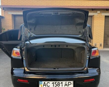 Чорний Міцубісі Lancer, об'ємом двигуна 2 л та пробігом 209 тис. км за 7600 $, фото 5 на Automoto.ua