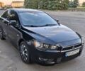 Черный Мицубиси Лансер, объемом двигателя 2 л и пробегом 190 тыс. км за 5400 $, фото 1 на Automoto.ua