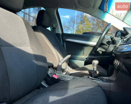 Черный Мицубиси Лансер, объемом двигателя 2 л и пробегом 215 тыс. км за 7000 $, фото 16 на Automoto.ua