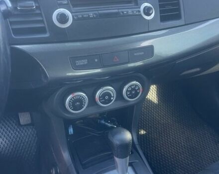 Черный Мицубиси Лансер, объемом двигателя 2 л и пробегом 250 тыс. км за 6500 $, фото 22 на Automoto.ua