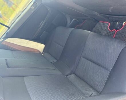 Черный Мицубиси Лансер, объемом двигателя 2 л и пробегом 216 тыс. км за 6950 $, фото 7 на Automoto.ua