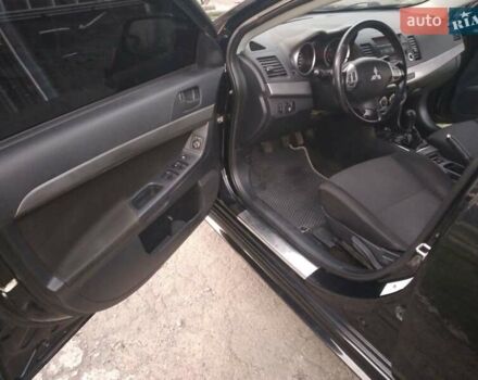 Чорний Міцубісі Lancer, об'ємом двигуна 2 л та пробігом 180 тис. км за 6999 $, фото 8 на Automoto.ua