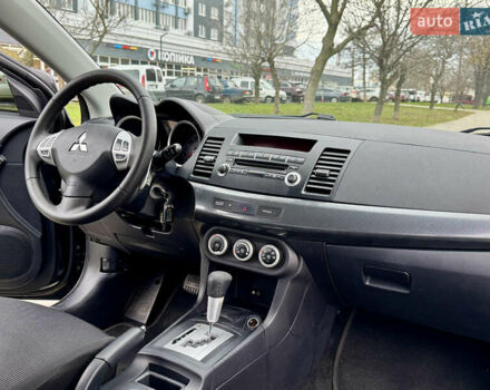 Черный Мицубиси Лансер, объемом двигателя 2 л и пробегом 221 тыс. км за 6750 $, фото 34 на Automoto.ua