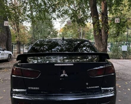 Чорний Міцубісі Lancer, об'ємом двигуна 2 л та пробігом 253 тис. км за 7300 $, фото 4 на Automoto.ua