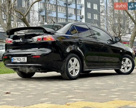 Черный Мицубиси Лансер, объемом двигателя 2 л и пробегом 221 тыс. км за 6750 $, фото 20 на Automoto.ua