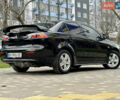 Черный Мицубиси Лансер, объемом двигателя 2 л и пробегом 221 тыс. км за 6750 $, фото 20 на Automoto.ua