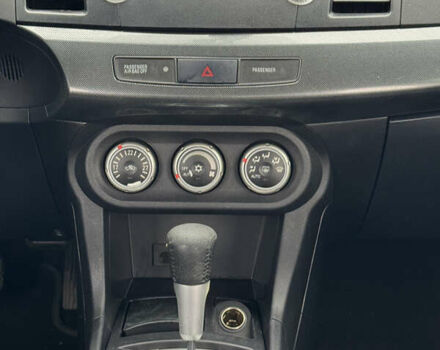 Черный Мицубиси Лансер, объемом двигателя 2 л и пробегом 221 тыс. км за 6750 $, фото 42 на Automoto.ua