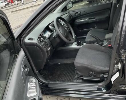 Чорний Міцубісі Lancer, об'ємом двигуна 1.6 л та пробігом 186 тис. км за 5500 $, фото 9 на Automoto.ua