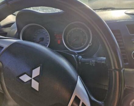 Черный Мицубиси Лансер, объемом двигателя 2 л и пробегом 184 тыс. км за 6999 $, фото 20 на Automoto.ua