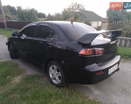 Чорний Міцубісі Lancer, об'ємом двигуна 2 л та пробігом 180 тис. км за 6999 $, фото 11 на Automoto.ua
