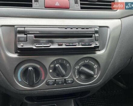 Чорний Міцубісі Lancer, об'ємом двигуна 1.6 л та пробігом 186 тис. км за 5500 $, фото 15 на Automoto.ua