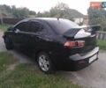 Чорний Міцубісі Lancer, об'ємом двигуна 2 л та пробігом 180 тис. км за 6999 $, фото 11 на Automoto.ua