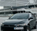 Чорний Міцубісі Lancer, об'ємом двигуна 1.5 л та пробігом 207 тис. км за 7500 $, фото 1 на Automoto.ua