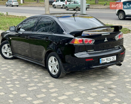 Черный Мицубиси Лансер, объемом двигателя 2 л и пробегом 221 тыс. км за 6750 $, фото 15 на Automoto.ua