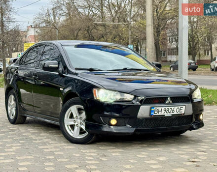Черный Мицубиси Лансер, объемом двигателя 2 л и пробегом 221 тыс. км за 6750 $, фото 8 на Automoto.ua