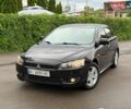 Чорний Міцубісі Lancer, об'ємом двигуна 2 л та пробігом 221 тис. км за 4950 $, фото 1 на Automoto.ua