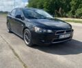 Чорний Міцубісі Lancer, об'ємом двигуна 2 л та пробігом 224 тис. км за 6800 $, фото 1 на Automoto.ua