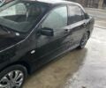 Чорний Міцубісі Lancer, об'ємом двигуна 1.59 л та пробігом 309 тис. км за 3900 $, фото 2 на Automoto.ua