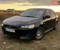 Чорний Міцубісі Lancer, об'ємом двигуна 2 л та пробігом 204 тис. км за 7500 $, фото 1 на Automoto.ua