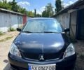 Чорний Міцубісі Lancer, об'ємом двигуна 1.6 л та пробігом 156 тис. км за 5200 $, фото 1 на Automoto.ua