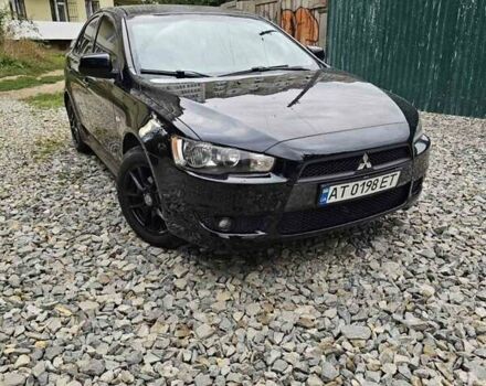 Чорний Міцубісі Lancer, об'ємом двигуна 2 л та пробігом 214 тис. км за 5900 $, фото 6 на Automoto.ua
