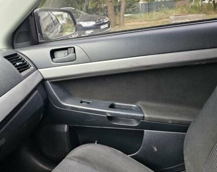 Чорний Міцубісі Lancer, об'ємом двигуна 2 л та пробігом 214 тис. км за 5900 $, фото 12 на Automoto.ua