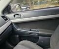 Чорний Міцубісі Lancer, об'ємом двигуна 2 л та пробігом 214 тис. км за 5900 $, фото 12 на Automoto.ua