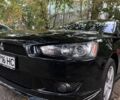 Чорний Міцубісі Lancer, об'ємом двигуна 2 л та пробігом 253 тис. км за 7300 $, фото 1 на Automoto.ua