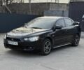 Чорний Міцубісі Lancer, об'ємом двигуна 2 л та пробігом 255 тис. км за 5500 $, фото 1 на Automoto.ua