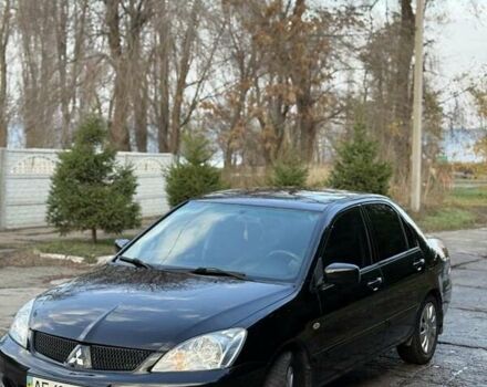 Чорний Міцубісі Lancer, об'ємом двигуна 1.6 л та пробігом 98 тис. км за 5600 $, фото 11 на Automoto.ua