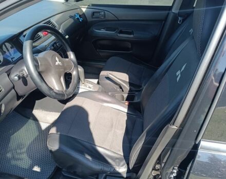 Чорний Міцубісі Lancer, об'ємом двигуна 1.6 л та пробігом 215 тис. км за 5200 $, фото 3 на Automoto.ua
