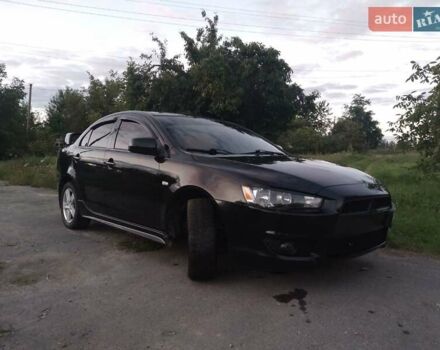 Чорний Міцубісі Lancer, об'ємом двигуна 2 л та пробігом 180 тис. км за 6999 $, фото 3 на Automoto.ua