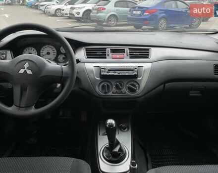 Чорний Міцубісі Lancer, об'ємом двигуна 1.6 л та пробігом 186 тис. км за 5500 $, фото 8 на Automoto.ua