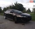 Чорний Міцубісі Lancer, об'ємом двигуна 2 л та пробігом 180 тис. км за 6999 $, фото 3 на Automoto.ua