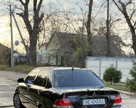 Чорний Міцубісі Lancer, об'ємом двигуна 1.6 л та пробігом 98 тис. км за 5600 $, фото 4 на Automoto.ua