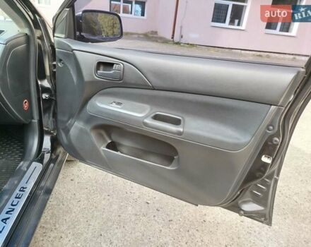 Черный Мицубиси Лансер, объемом двигателя 1.58 л и пробегом 78 тыс. км за 6500 $, фото 22 на Automoto.ua