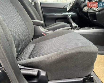 Чорний Міцубісі Lancer, об'ємом двигуна 1.58 л та пробігом 128 тис. км за 5999 $, фото 19 на Automoto.ua