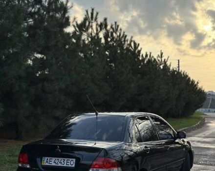 Чорний Міцубісі Lancer, об'ємом двигуна 1.6 л та пробігом 98 тис. км за 5600 $, фото 3 на Automoto.ua