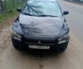 Черный Мицубиси Лансер, объемом двигателя 2 л и пробегом 140 тыс. км за 8800 $, фото 1 на Automoto.ua