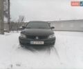 Черный Мицубиси Лансер, объемом двигателя 1.58 л и пробегом 94 тыс. км за 6200 $, фото 1 на Automoto.ua