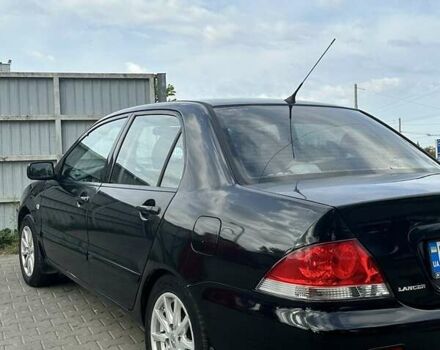 Чорний Міцубісі Lancer, об'ємом двигуна 1.6 л та пробігом 220 тис. км за 3000 $, фото 3 на Automoto.ua