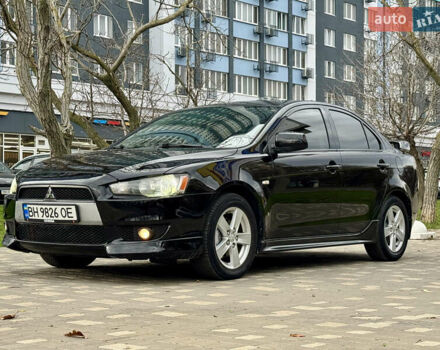 Черный Мицубиси Лансер, объемом двигателя 2 л и пробегом 221 тыс. км за 6750 $, фото 3 на Automoto.ua